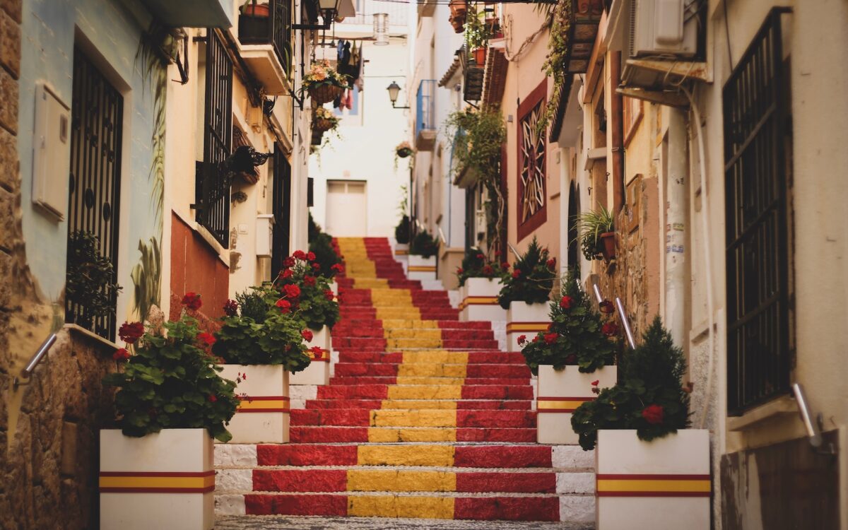 red, yellow, and white concrete stairs