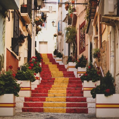 red, yellow, and white concrete stairs