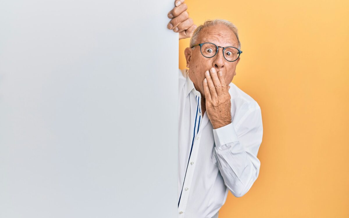 man in white dress shirt wearing black framed eyeglasses