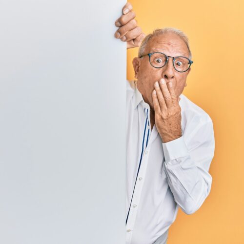 man in white dress shirt wearing black framed eyeglasses